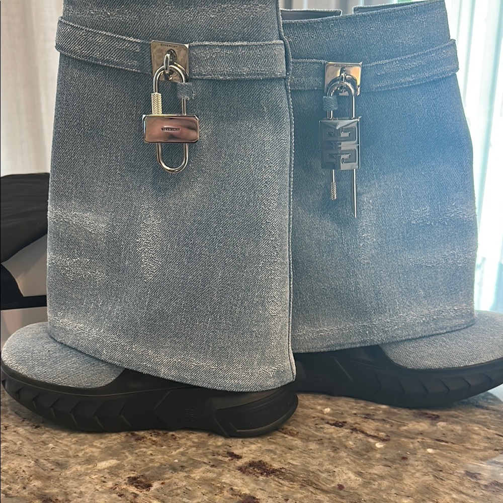 GIVENCHY
Washed Denim Shark Lock Biker Ankle Boots